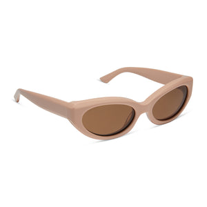 iconica x diff eyewear petra cat eye sunglasses with a nude acetate frame and brown polarized lenses angled view