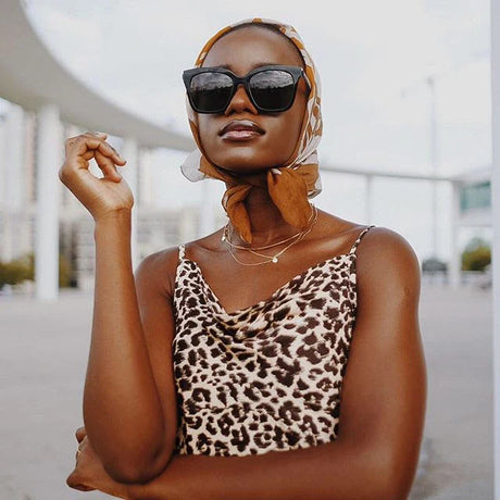 Model wearing black bella sunglasses
