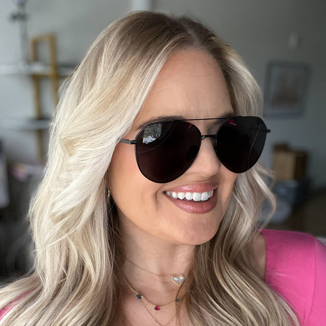 customer content - lovefashionably_  wearing diff eyewear dash aviator sunglasses with matte black frame and solid grey polarized lens front view