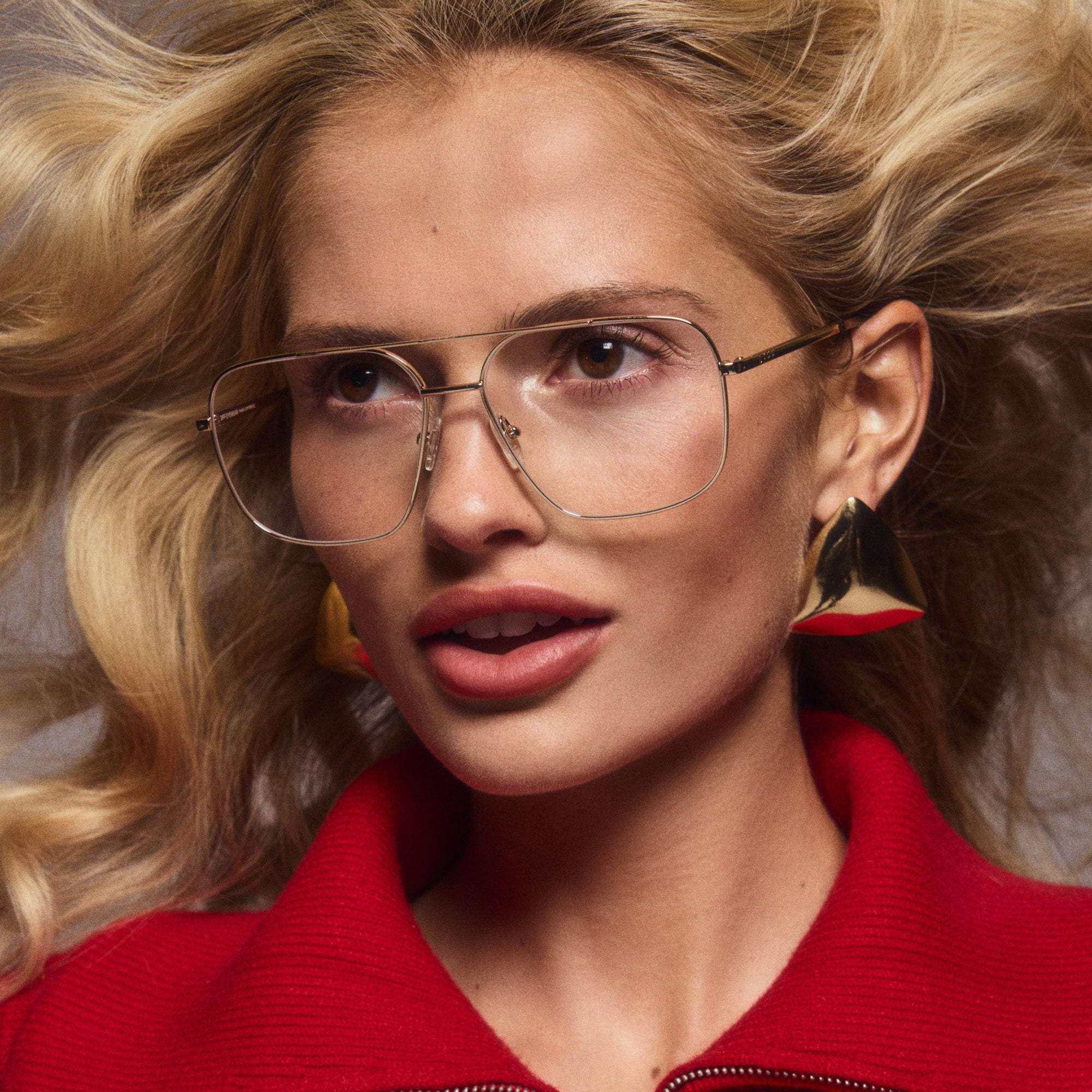 Close-up portrait shot of young woman wearing Jonas glasses