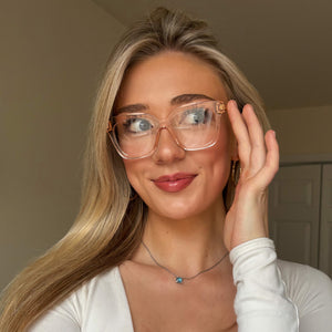 lifestyle - female wearing diff eyewear bella xs square prescription glasses with a vintage rose crystal frame front view