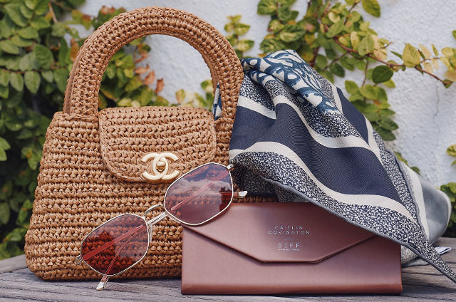 Still life - Caitlin Covington x DIFF Eyewear Kenndy Sunglasses with case and purse