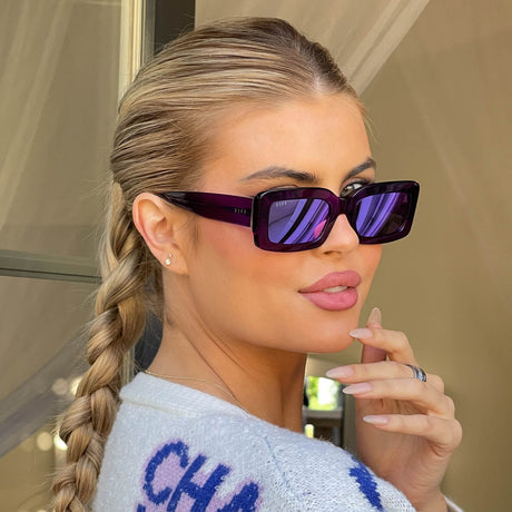 blonde model wearing gold inca sunglasses