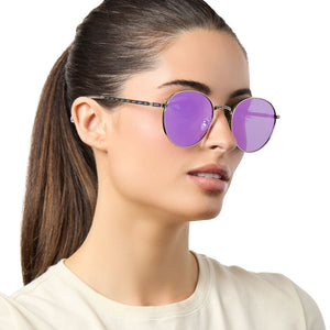 on model - female wearing lifestyle star wars x diff eyewear mace windu round sunglasses with space oxidized steel metal frame and lightsaber™️ purple lenses angled view