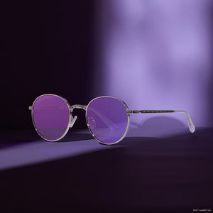 lifestyle - star wars x diff eyewear mace windu™️ round sunglasses with space oxidized steel metal frame and lightsaber™️ purple lenses angled view