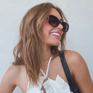 Aspyn Ovard Cove Oval Sunglasses | Black & Grey | DIFF Eyewear display picture 2