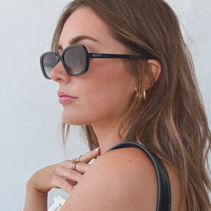 Aspyn Ovard Cove Oval Sunglasses | Black & Grey | DIFF Eyewear display picture 1