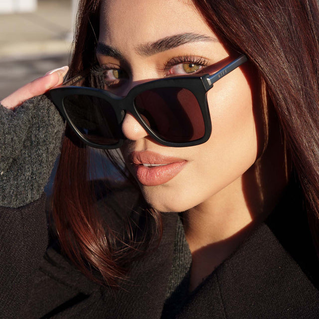 customer content - LiaLizardo wearing diff eyewear bella black grey polarized sunglasses