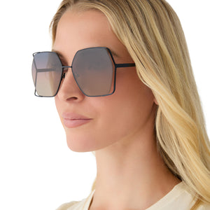 on model - female wearing diff eyewear donna iv square sunglasses black metal frame & twilight gradient lenses side view