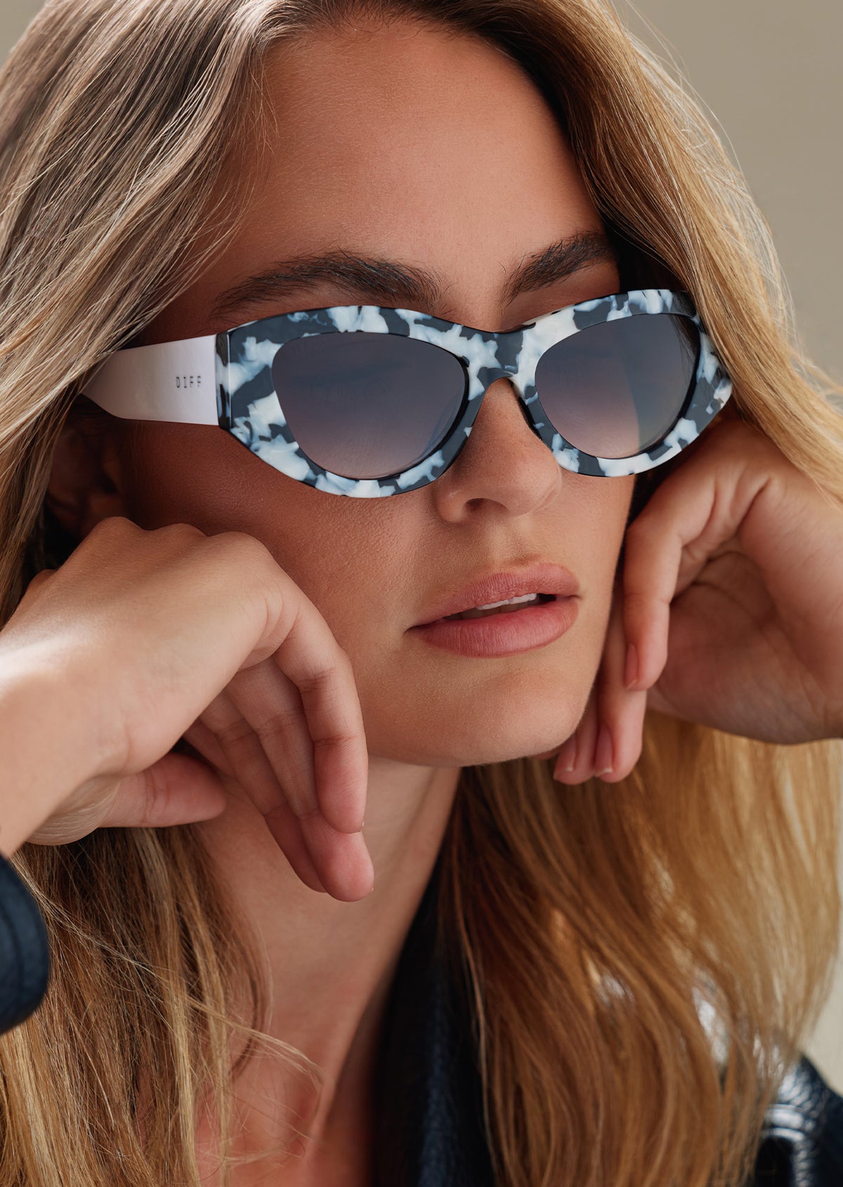 female wearing diff eyewear x disney villains cruella de vil sunglasses