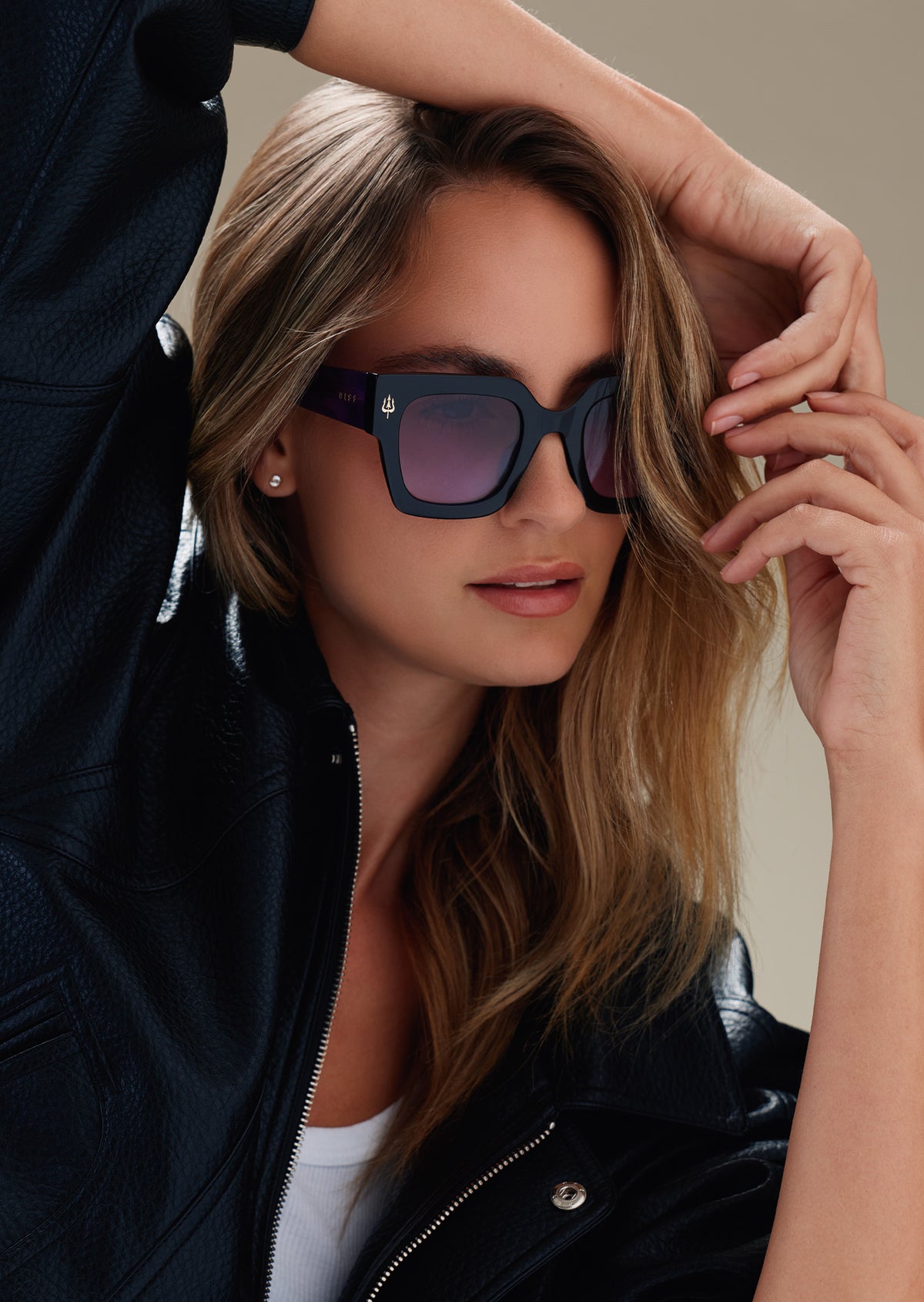 female wearing diff eyewear x disney villains ursula sunglasses