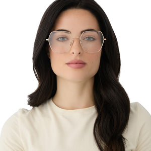 on model - female wearing diff eyewear featuring the harlowe hexagon prescription glasses with a gold frame front view