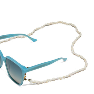 diff eyewear iconica small shell chain in white attached to naomi parasido sunglasses (not included)