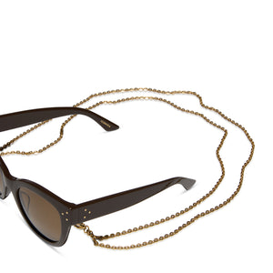 diff eyewear iconica double metal fine chain in gold attached to sunglasses