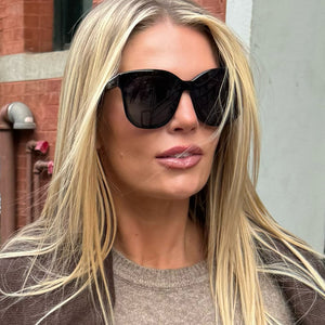 lifestyle - female wearing Gia Black and Grey Oversized Cat Eye Sunglasses
