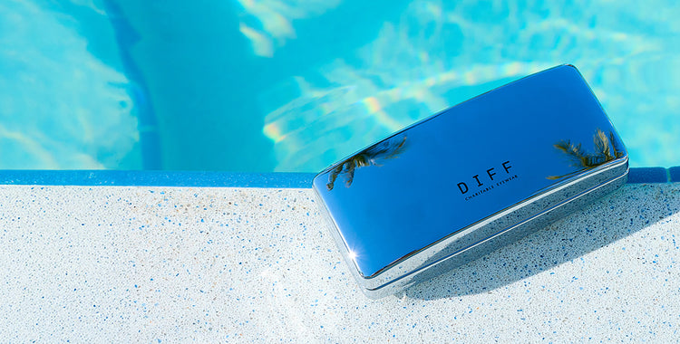 Three DIFF 4-pair case on dark concrete floor where shadow is casted all around and light passing towards the cases