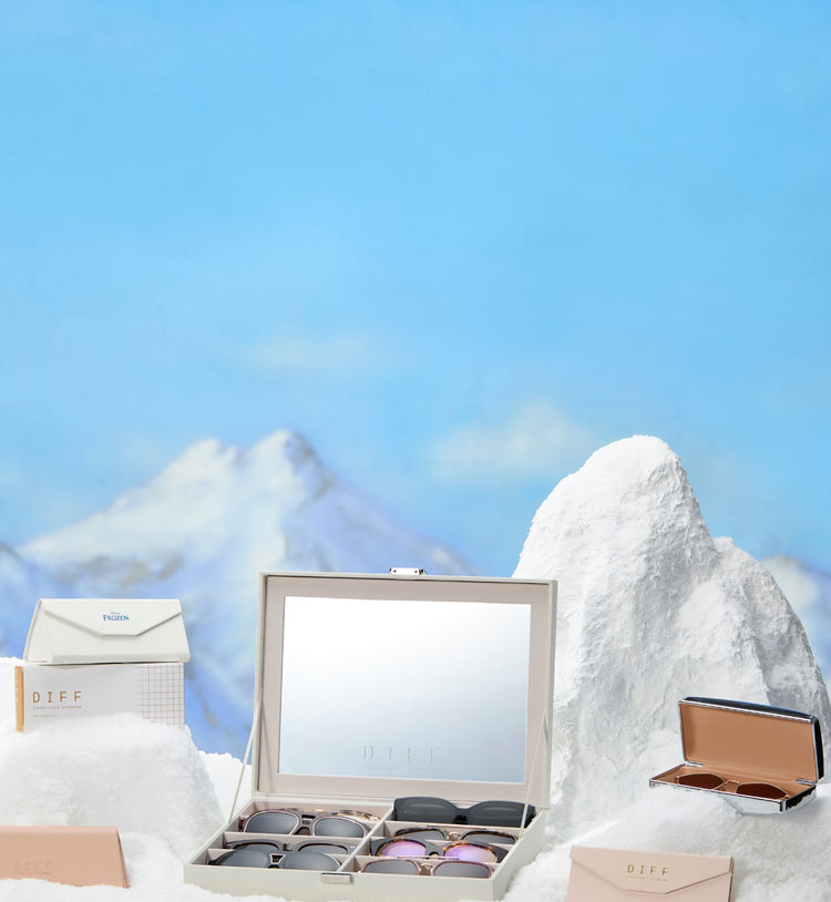 Three DIFF 4-pair case on dark concrete floor where shadow is casted all around and light passing towards the cases