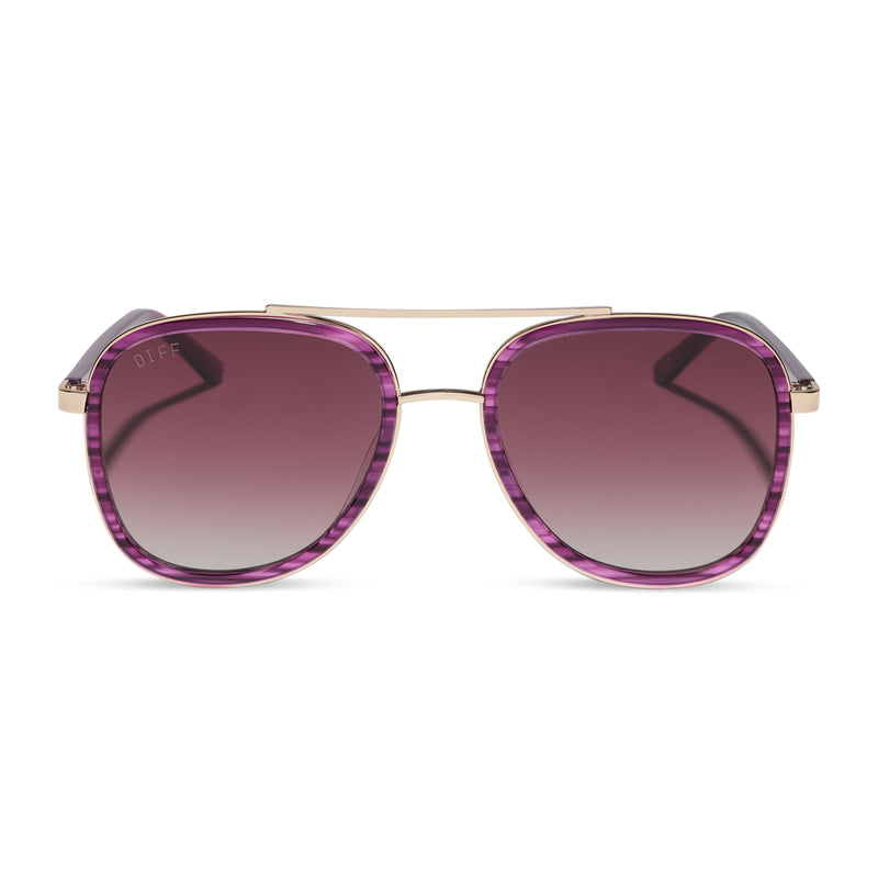 diff eyewear x disney alice in wonderland cheshire cate oversized navigator sunglasses with a purple frame and pink gradient lenses front view