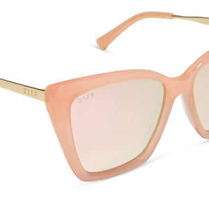 diff eyewear featuring the becky ii cat eye sunglasses with a peach frame and cherry blossom mirror lenses detailed view