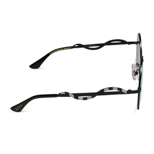beetlejuice x diff eyewear featuring the beetlejuice round sunglasses with a black frame and lime green mirror lenses side view