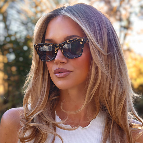 lifestyle - ashley smith wearing bradley glitter tortoise sunglasses