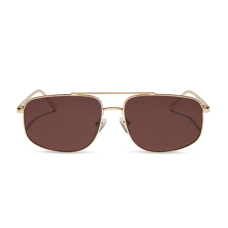 diff eyewear featuring the charley navigator sunglasses with a gold metal frame and brown polarized lenses front view