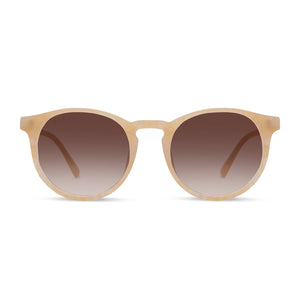 diff eyewear sawyer round sunglasses with a citrine pearl frame and brown gradient lenses front view