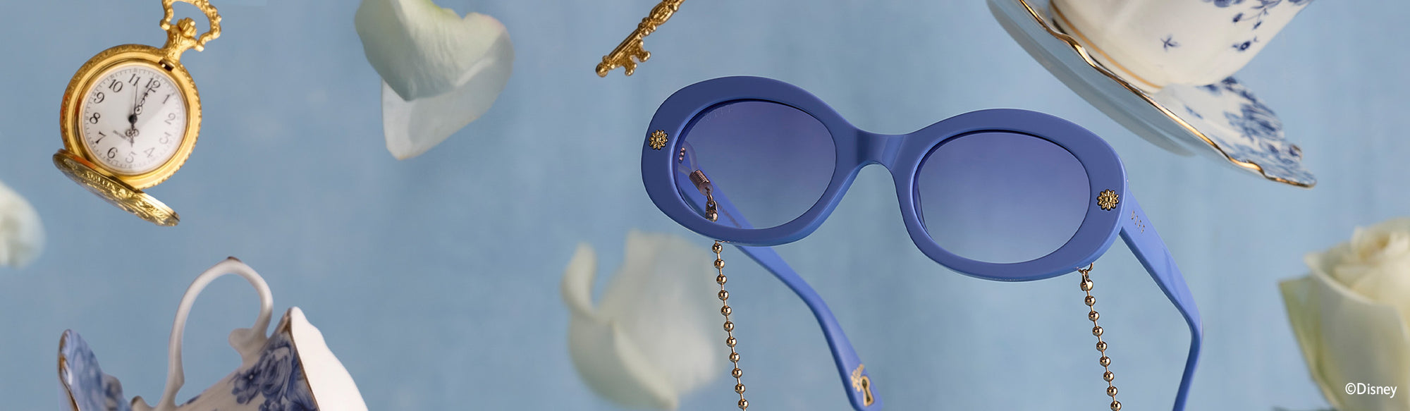 Blue Alice in Wonderland sunglasses floating among pocket watch and teacup