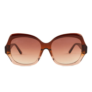 patricia nash x diff eyewear farrah round sunglasses with a tan sand ombre frame and brown gradient lenses front view