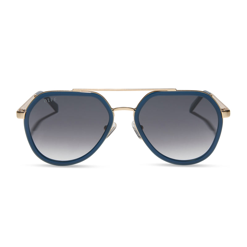 diff eyewear featuring the joey round sunglasses with a clubhouse blue & brushed gold metal frame with grey gradient lenses front view