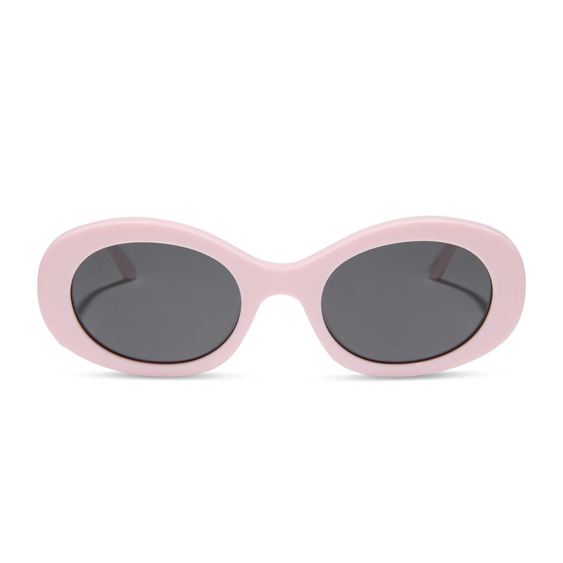 diff eyewear featuring the lainey oval sunglasses with a powder pink frame and grey polarized lenses front view