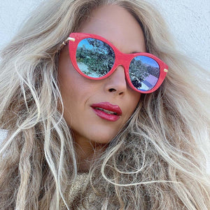 lifestyle - Obsessedandyouneedit wearing the Harry Potter collection Luna Lovegood pink and purple mirror womens sunglasses from DIFF Eyewear