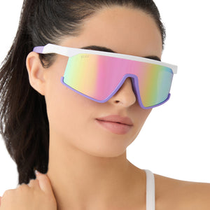 on model - female wearing diff sport featuring the spike shield sunglasses with a matte white + lavender frame and sherbert rainbow mirror polarized lenses front view