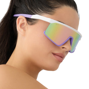 on model - female wearing diff sport featuring the spike shield sunglasses with a matte white + lavender frame and sherbert rainbow mirror polarized lenses side view