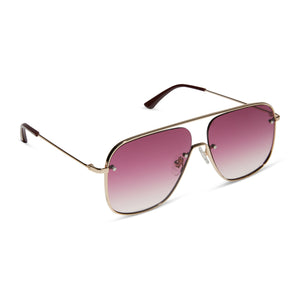 iconica featuring the cynthia navigator sunglasses with a gold with bordeaux temple tips frame and wine gradient polarized lenses angled view
