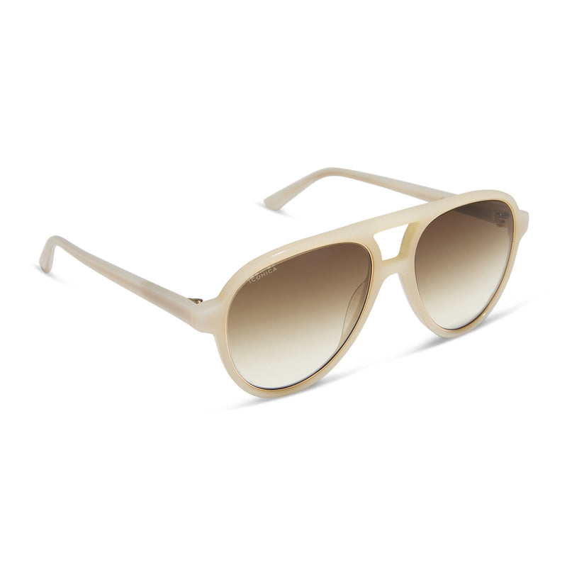 diff eyewear featuring the pia aviator sunglasses with a meringue cream frame and brown gradient polarized lenses angled view
