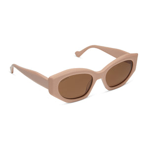 iconica x diff eyewear margot cat eye sunglasses with a nude acetate frame and brown gradient polarized lenses angled view