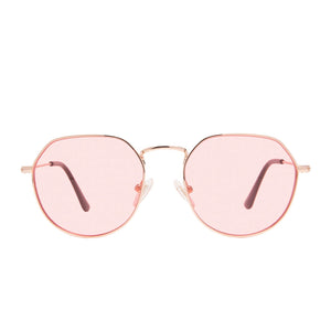 diff eyewear james round sunglasses with a rose gold frame and pink transparent lenses front view