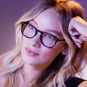 lifestyle - female model wearing jaxson vintage crystal with blue light tech glasses
