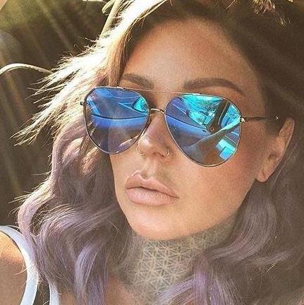 customer content - female wearing diff eyewear dash aviator sunglasses with matte black frame and blue mirror polarized lens 