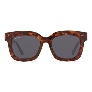 diff eyewear makay cat eye sunglasses with a amber tortoise frame and grey lenses front view