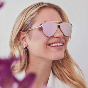 blonde model wearing tate - rose gold + cherry blossom mirror sunglasses